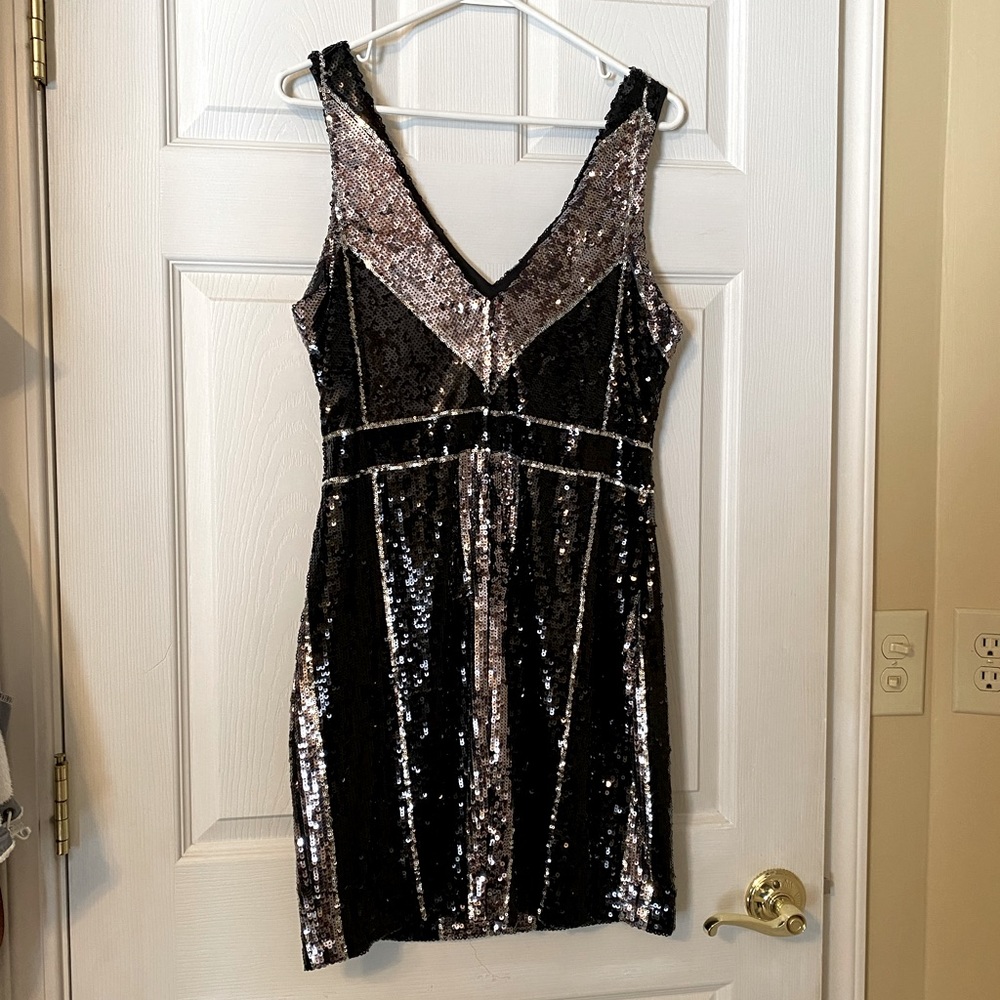 Silver and Black Sequin Dress. Form fitting size 13/14.